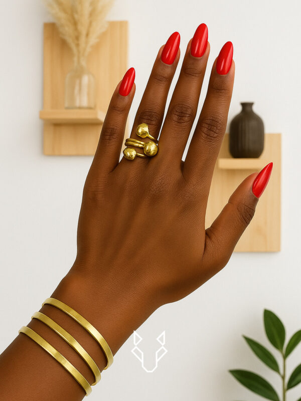 THREE BALL BRASS RING